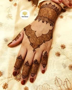 Arabic Mandala mehndi design for back hand — graceful henna pattern